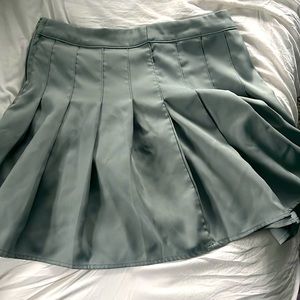sage green pleated skirt